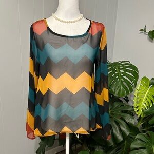 #9)  October Sky Sheer high- low bell sleeve top
